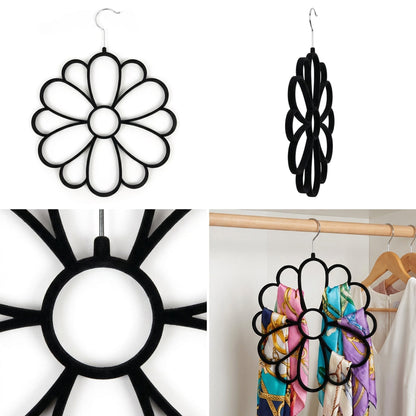 Black velvet accessory hanger holding scarves