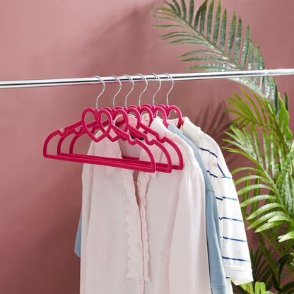 Dark pink kids velvet hangers stacked