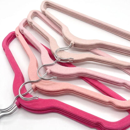 Pink velvet hanger chrome hook detail