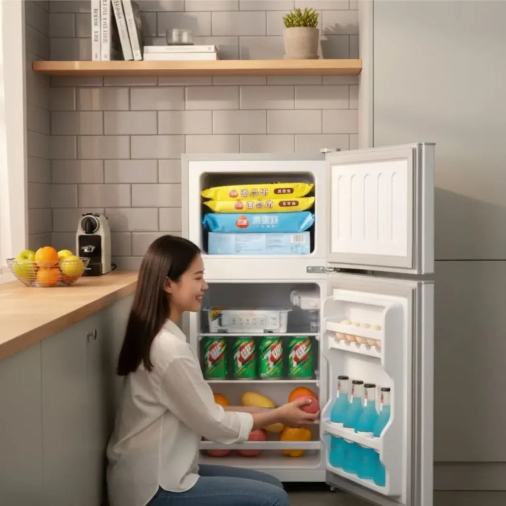 Goldair GDD-120 fridge freezer with doors open showing shelves